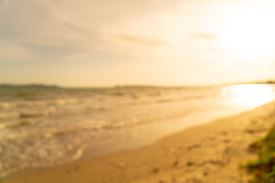 abstract blur beautiful sea beach with sunset time for background