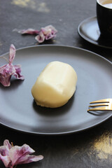 Healthy cottage cheese dessert in a plate on the table