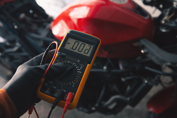 electrician check motorcycle wiring with tester