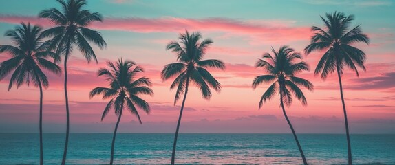 Tropical sunset with silhouetted palm trees and colorful sky over ocean.