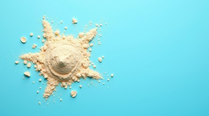 Obraz premium A Creative Arrangement of Powdered Substance on a Bright Blue Background Capturing Simplicity and Artistry