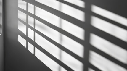 Shadows from window blinds on a wall
