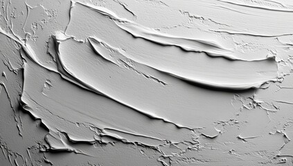 A fascinating background is created by the interesting texture of white decorative plaster