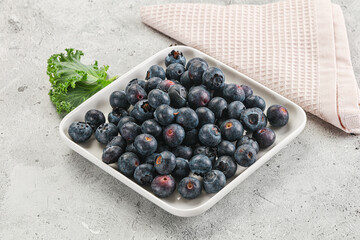 Sweet ripe blueberry on the bowl