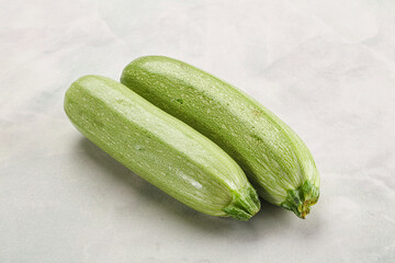 Raw green ripe zucchini vegetable