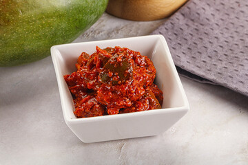 Spicy pickled raw green mango