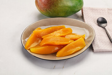 Canned mango slices in the bowl
