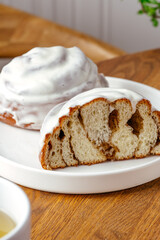Cinnabon with butter cream half cut