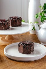 brownies with chocolate syrup on a plate