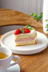 biscuit dessert with strawberries and tea