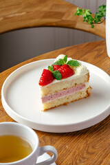 biscuit dessert with strawberries and tea