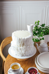 white wedding cake with waves