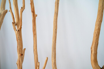 Natural background of white wall decorated with wood