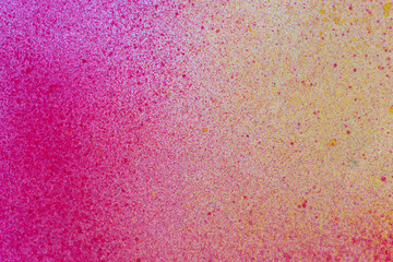 赤色と黄色のスプレー塗料の背景