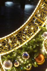 Gold shiny frame with bubbles and fir decoration. Christmas background for postcards and wishes.