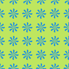 Vector pattern with blue swirl flowers on a light green background