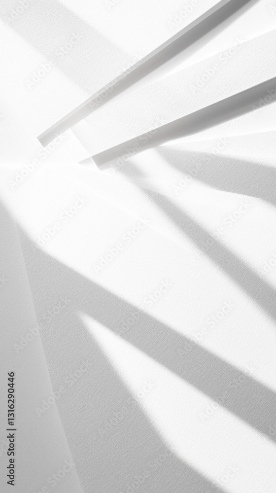 Poster Gentle rays of sunlight filter through, casting elongated shadows that converge and diverge across a smooth white surface. The result is a tranquil, abstract interplay of light and shadow