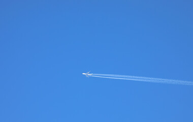 Airliner Flying High Blue Sky