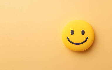 A bright yellow smiley face icon on a smooth monochromatic background, symbolizing happiness, positivity, and optimism in a minimalist style.
