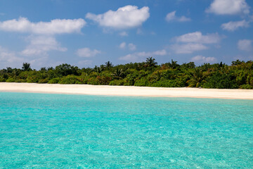 Turquoise sea water and tropical island