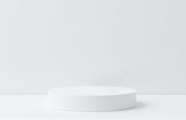 A Small White Podium Sits In Isolation On A Plain White Surface With Nothing Else In Sight.