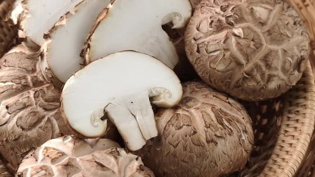 Fresh shiitake mushrooms on a wooden background