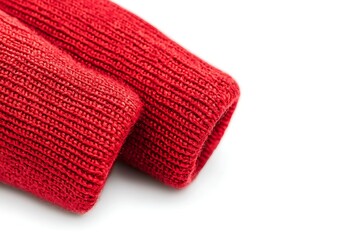 Two red knitted sleeves are shown, featuring a textured pattern against a white background, showcasing vibrant color and cozy fabric.