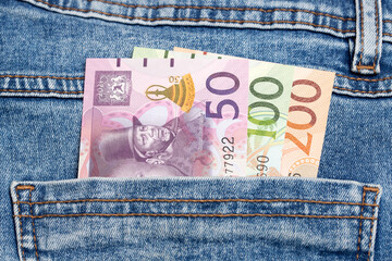 Lesotho Loti  in the pocket of blue jeans
