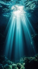 Fototapeta premium Enchanting underwater realm light dances in deep blue waters