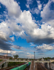 Train is crossing a bridge over a train track