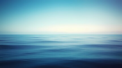 Fototapeta premium Oceanic Serenity: Capturing a calm seascape with a gradient sky, the image focuses on the tranquil movement of the ocean, inviting contemplation and a sense of peace.