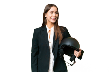 Young Asian woman with a motorcycle helmet over isolated chroma key background looking to the side and smiling