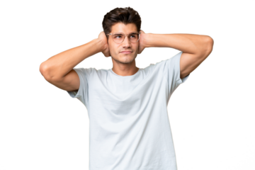 Young caucasian handsome man over isolated background frustrated and covering ears
