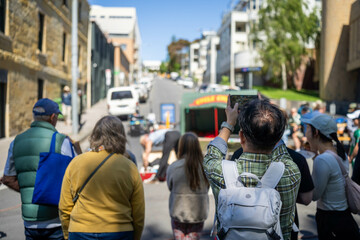 people watching street performer in australia