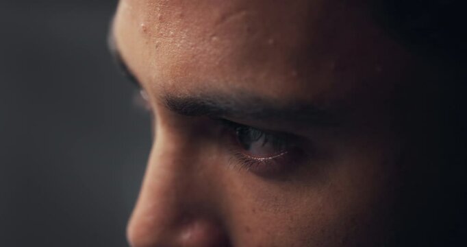 Thinking, eyes and man with vision closeup, insight or reflection on gray studio background. Idea, face and zoom with person planning decision, problem solving and inspiration with macro for mindset