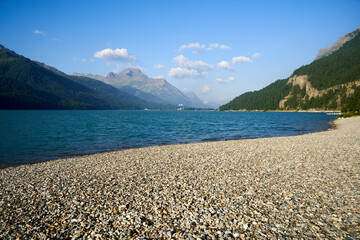Lake Silvaplana in Switzerland. Landscape in summer with mountains and blue sky. Swiss, Sankt Moritz, Engadin.