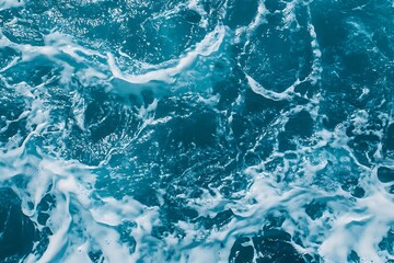 Obraz premium Ocean waves, white foam, turquoise water texture.