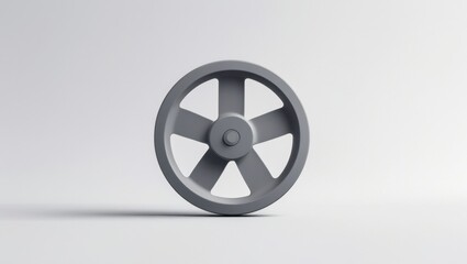Fototapeta premium Sleek Gray Flywheel in Spotlight Against White Background Simple Mechanical Design Industrial Component Concept