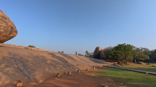 UHD 4K / 60 FPS Video - Krishna Butter Ball is UNESCO's World Heritage Site located at Mamallapuram or Mahabalipuram in Tamil Nadu, South India.one of the very ancient place & wonder place in world.