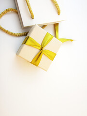 gift box with gold ribbon