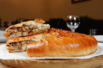 This delicious, savory pastry is freshly baked and filled with seasoned meat, perfect for any mealtime