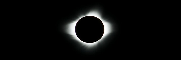 Solar Eclipse in space shows sun covered by the moon with corona visible for astronomy use
