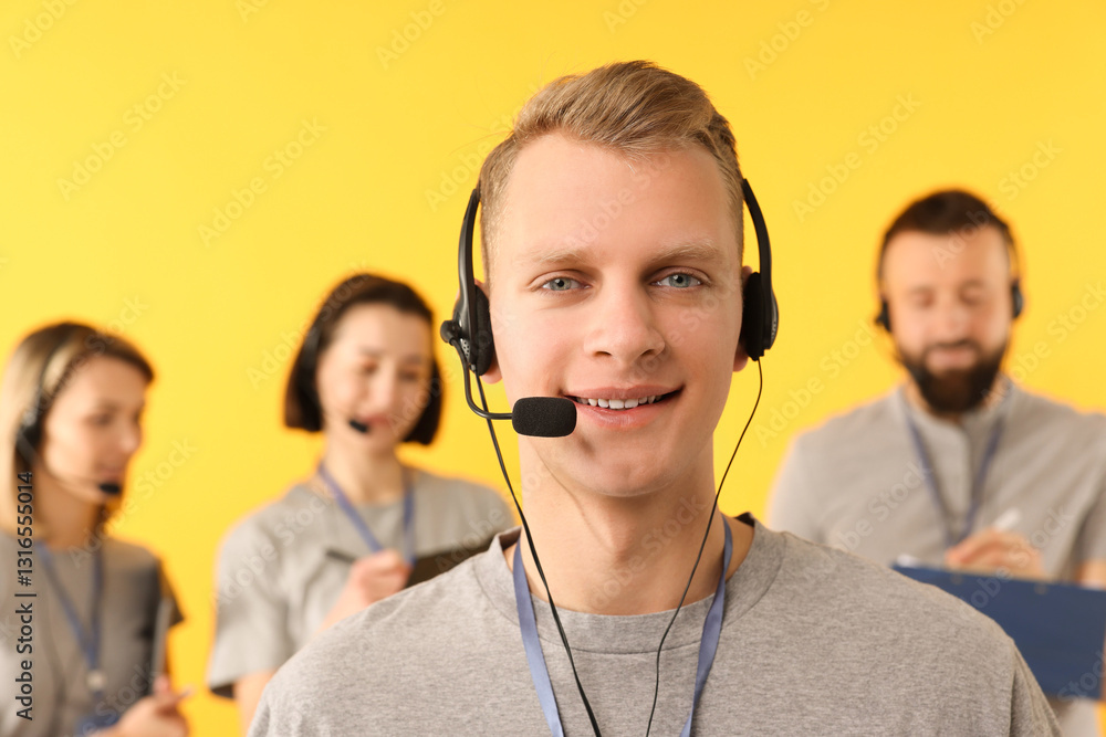 Poster technical support call center. smiling operator on yellow background, selective focus