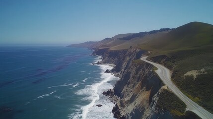 Fototapeta premium aerial drone view of an ocean road trip, a scenic coastal highway winding along the rugged cliffs, waves crashing below, a perfect adventure route