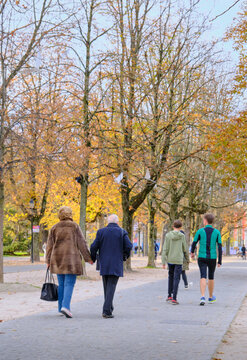 People walking at the park in autumn, Parc des Bastions, Geneva, Switzerland