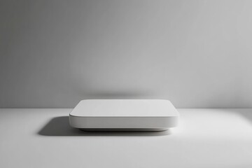 Minimalist white square podium on white background.