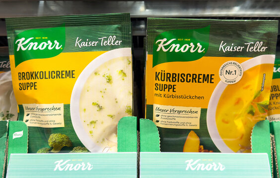 Knorr soup packaging display with broccoli and pumpkin cream varieties in supermarket