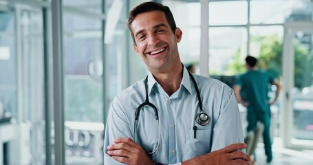 Face, doctor and happy man in hospital with arms crossed for healthcare service, medicine and wellness. Medical professional, cardiologist and portrait of employee, pride and confidence in clinic