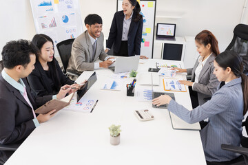 Group of business people working together with dashboard analysis and data management a meeting table in office.