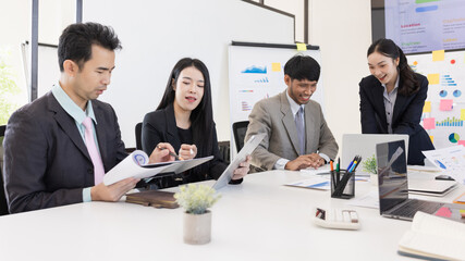 Group of business people working together with dashboard analysis and data management a meeting table in office.